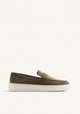 Green penny loafers with rounded moc toes and white platform soles