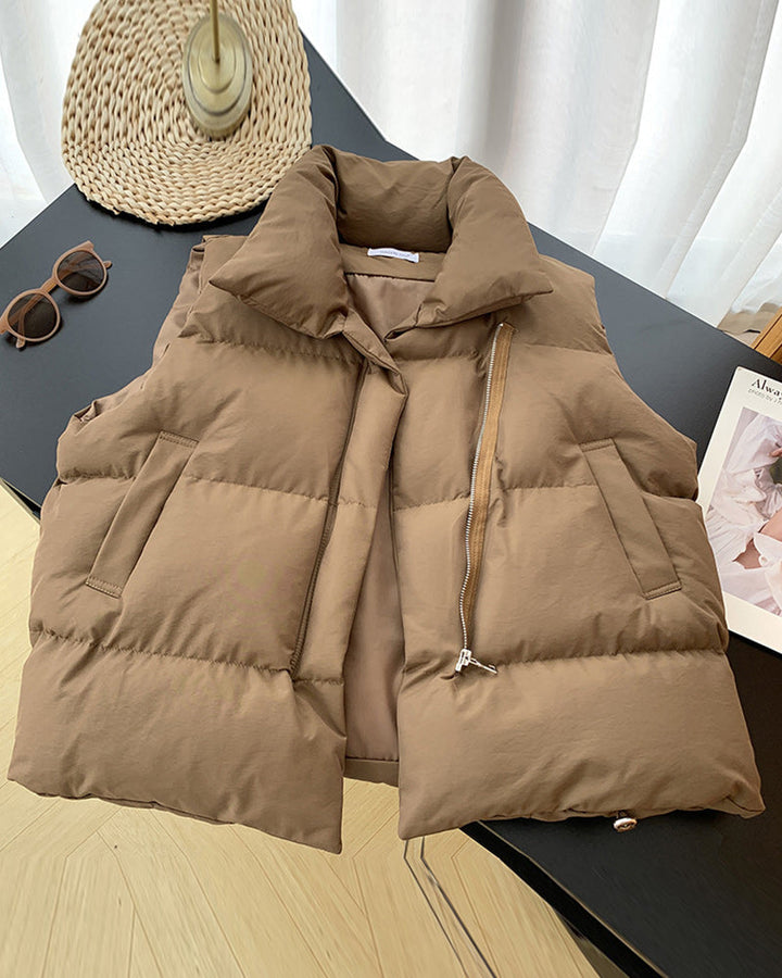 Sleeveless quilted puffer vest with stand collar, front zipper and side pockets