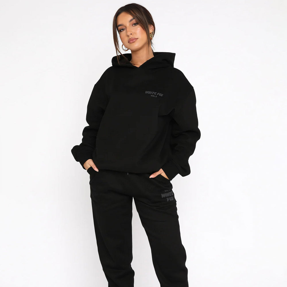 Women's hoodie and jogger tracksuit set with hood and pockets