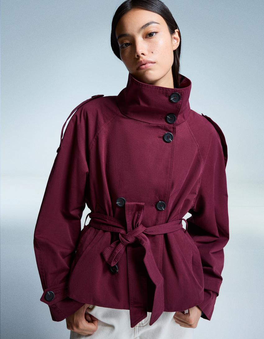 Women's trench jacket with high collar, button front, tie belt and long sleeves