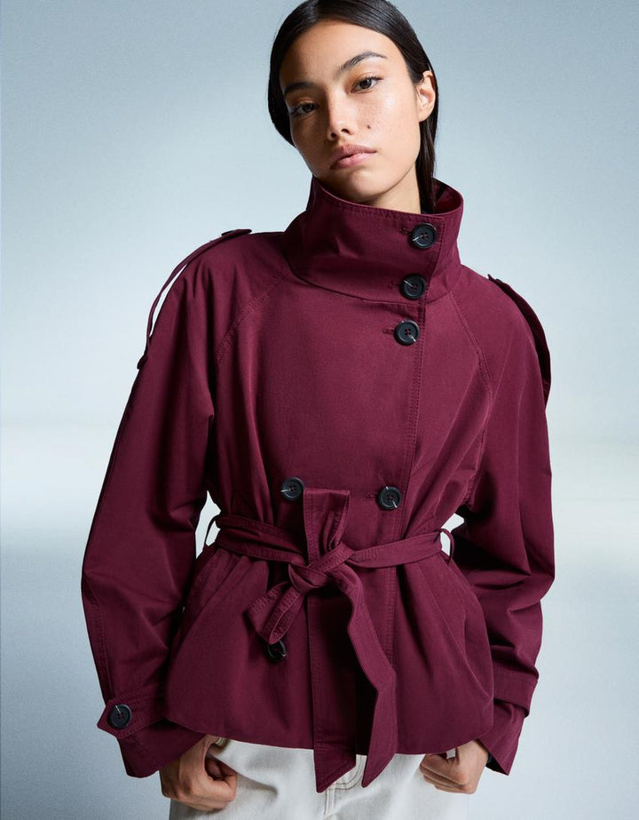 Women's trench jacket with high collar, button front, tie belt and long sleeves