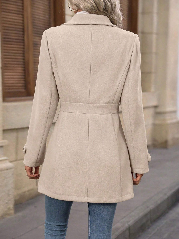 Women's belted trench coat with button front