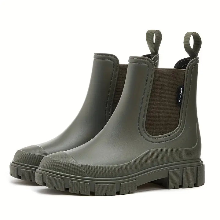 Women's slip-on Chelsea boots with elastic sides and lug soles