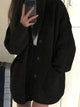 Women's ribbed button-front cardigan with V-neck, long sleeves and patch pockets