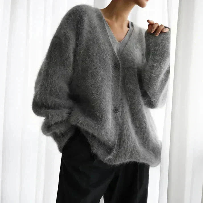 Women's fuzzy knit V-neck cardigan with button front and long sleeves