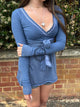 Women's ribbed wrap babydoll top with V-neckline and long sleeves