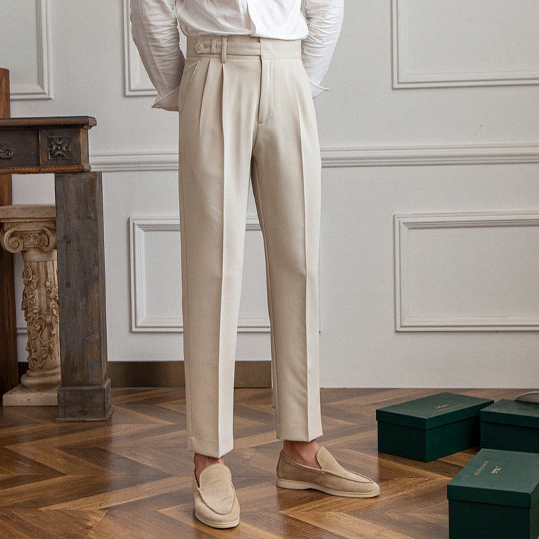 High-waisted pleated straight-leg trousers with belt