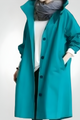 Women's longline hooded jacket with button front and gathered sleeves