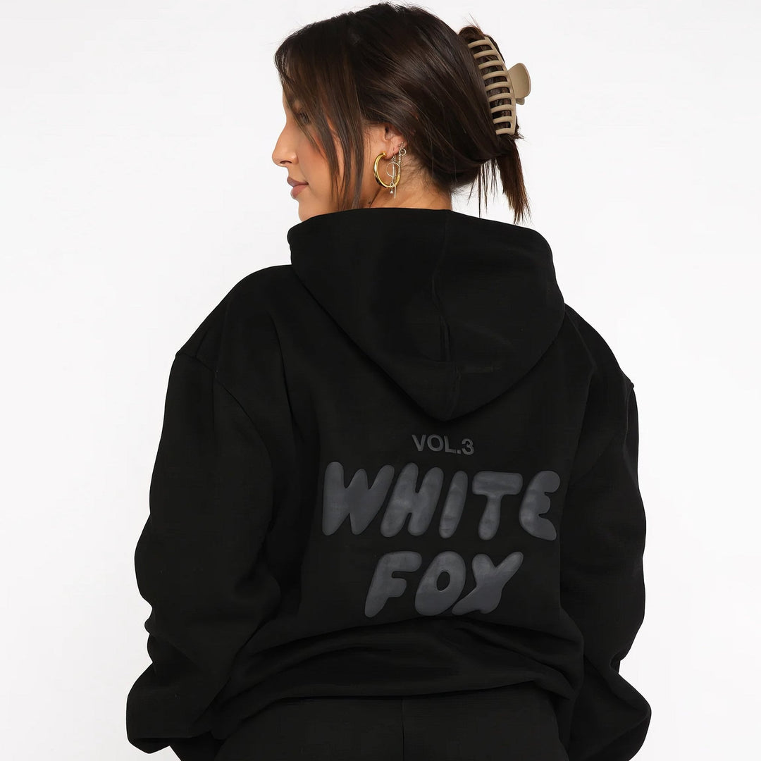 Women's hoodie and jogger tracksuit set with hood and pockets