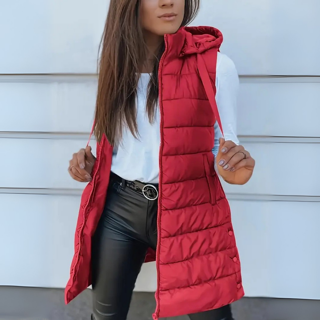 Women's long sleeveless hooded quilted puffer vest with zip front