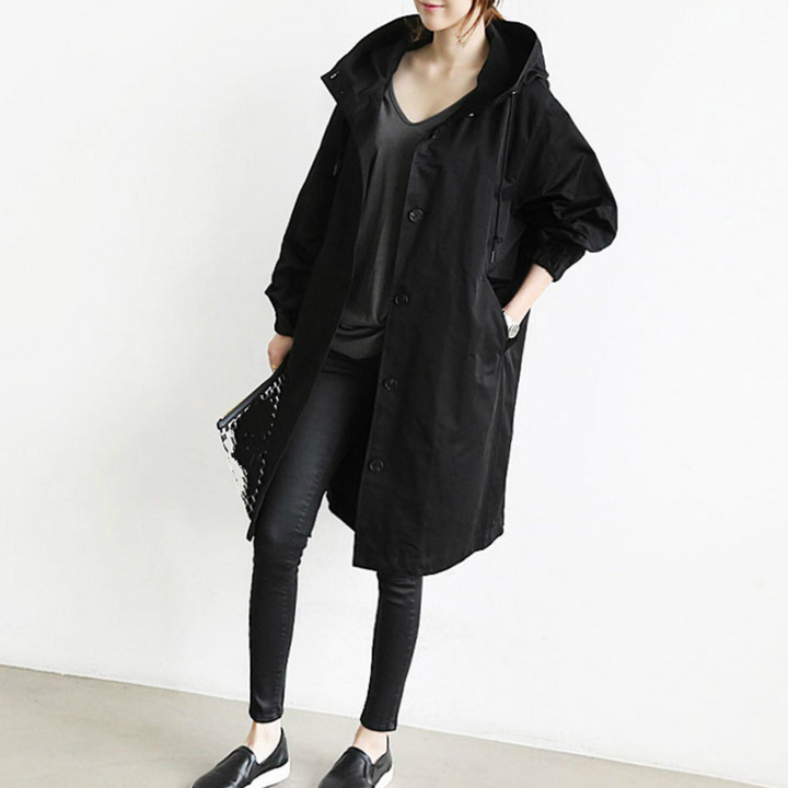Women's hooded mid-length button front coat with long sleeves and front pockets
