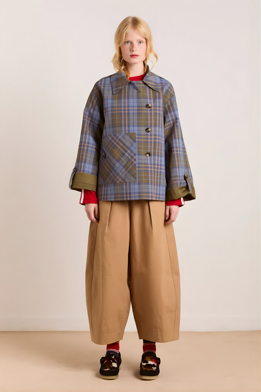 Women's olive utility jacket with blue plaid panels and long sleeves