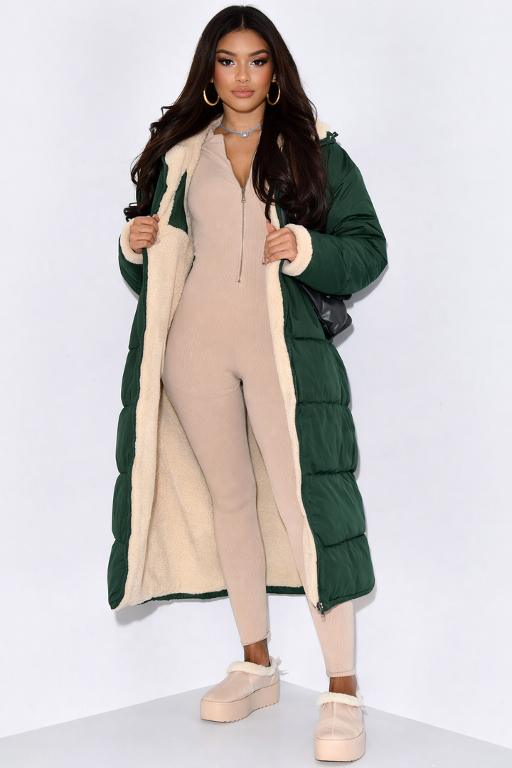 Women's longline reversible hooded quilted jacket shown with fleece-look lining