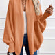 Women's draped open-front cardigan with shawl collar and ribbed cuffs