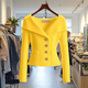 Women's ribbed button front cardigan with shawl collar, long sleeves and front pockets