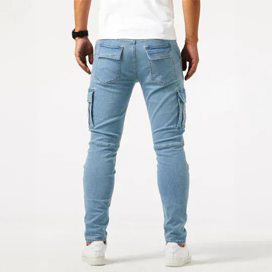 Men's tapered cargo jeans with multiple thigh pockets and panel detailing