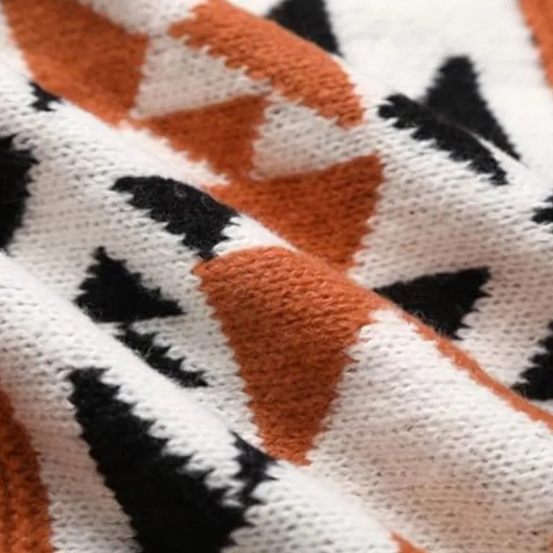 Orange geometric patterned cardigan with high collar and front zipper
