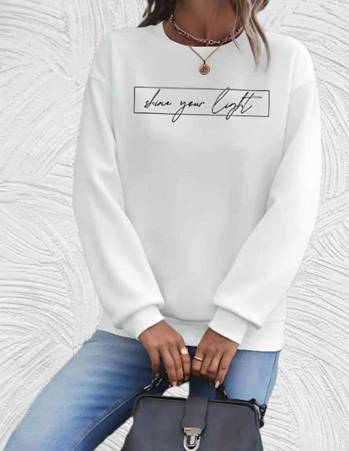 Women's crew-neck sweatshirt with framed shine your light text print