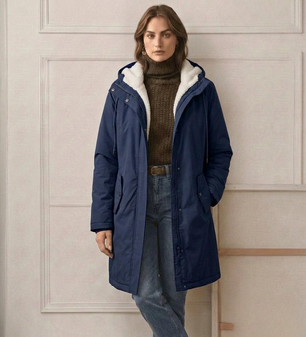 Women's long hooded parka with lined interior and flap pockets