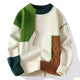 Unisex patchwork cable knit sweater with crew neck and long sleeves