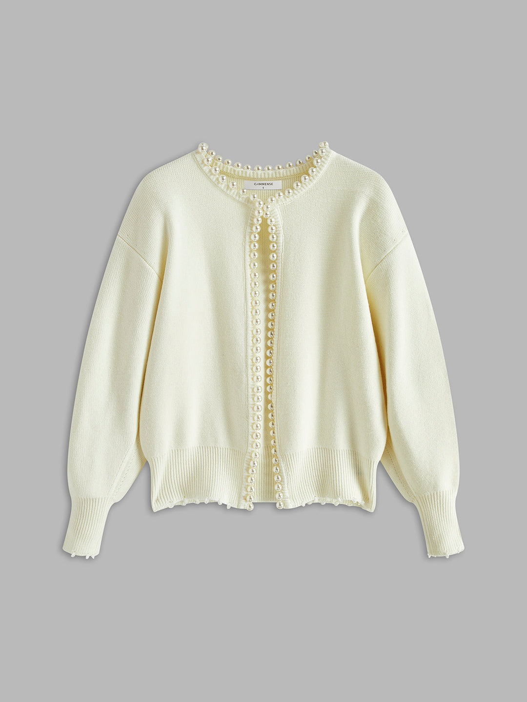 Women's open-front knit cardigan with pearl-style trim and long sleeves