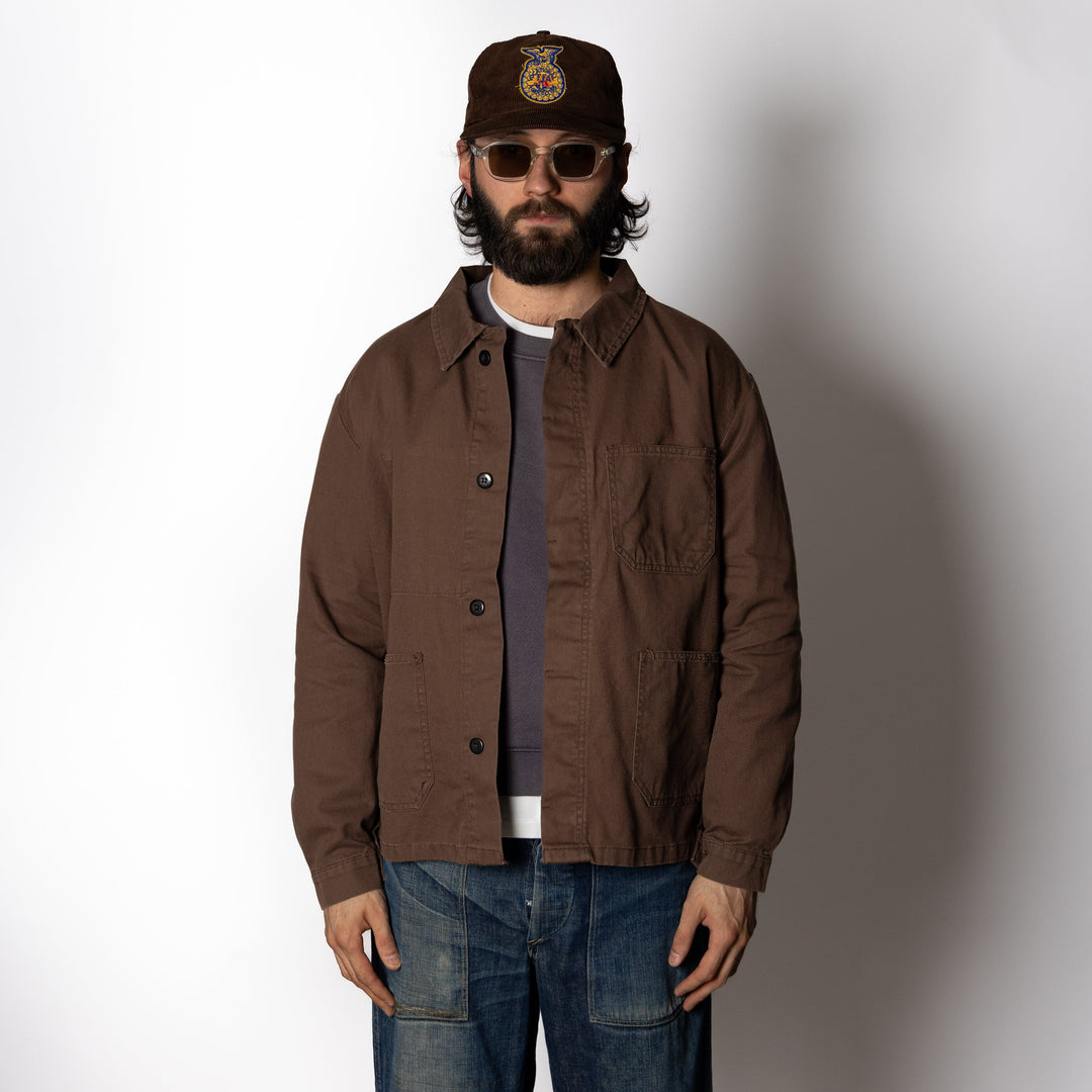 Brown utility jacket with button front and patch pockets