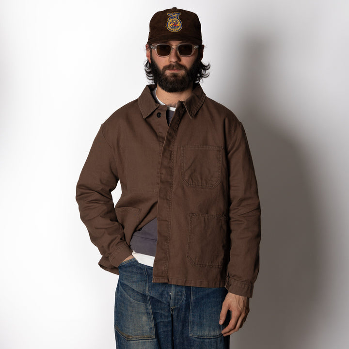 Brown utility jacket with button front and patch pockets