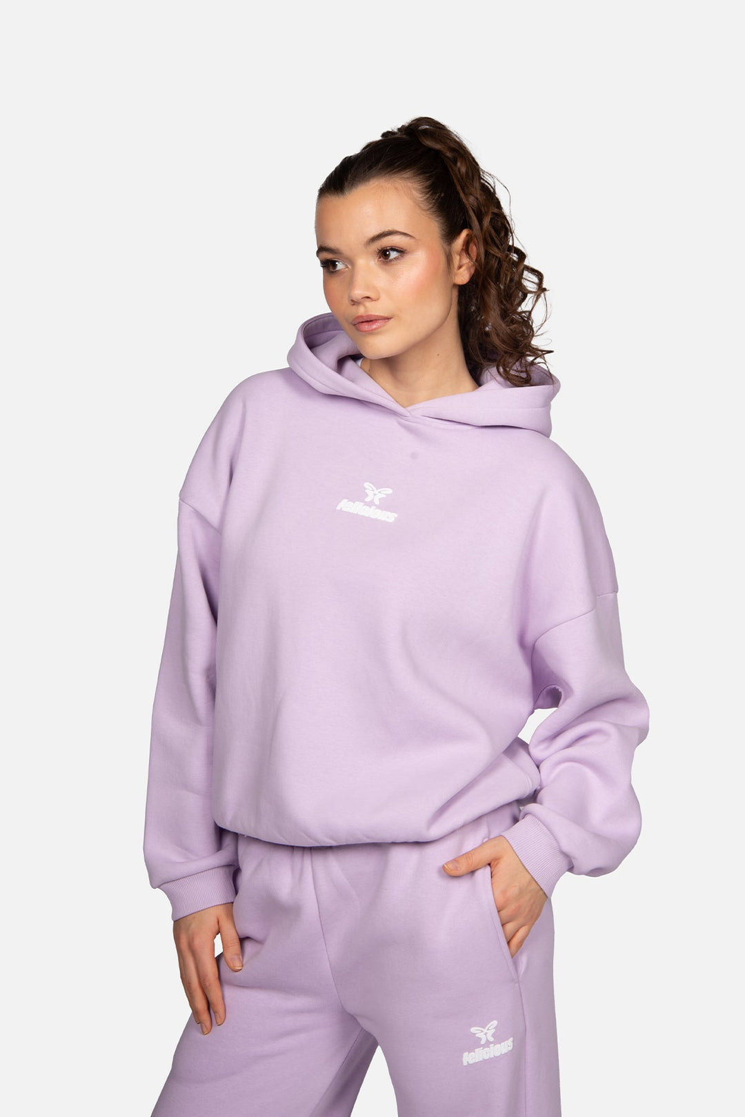 Women's lavender hooded sweatshirt with long sleeves and front logo