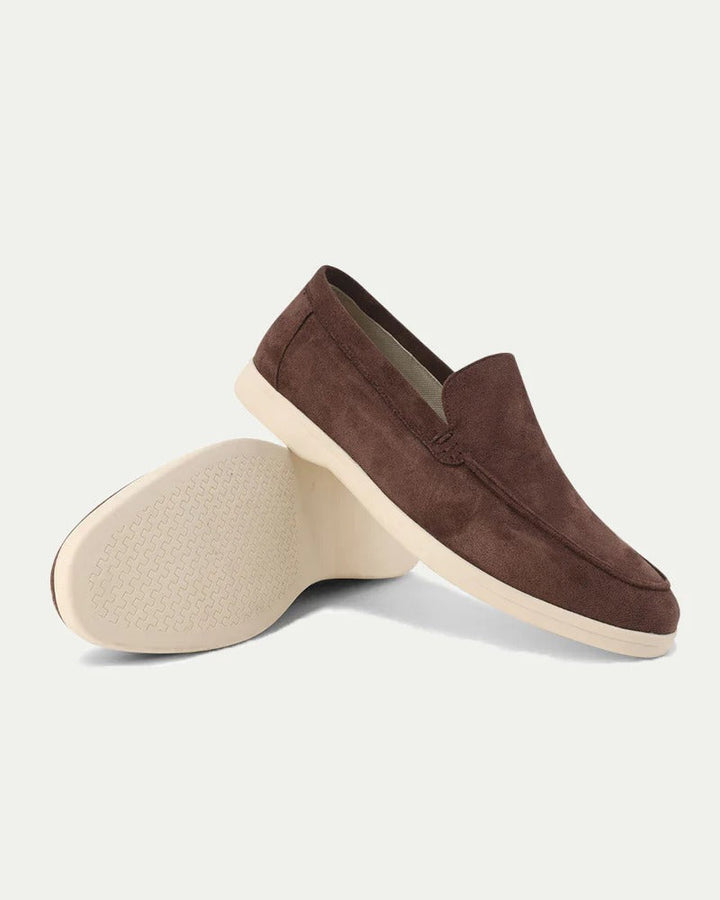 Men's slip-on loafers with stitched moc toe detailing and flat light-coloured soles
