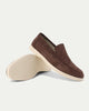 Men's slip-on loafers with stitched moc toe detailing and flat light-coloured soles