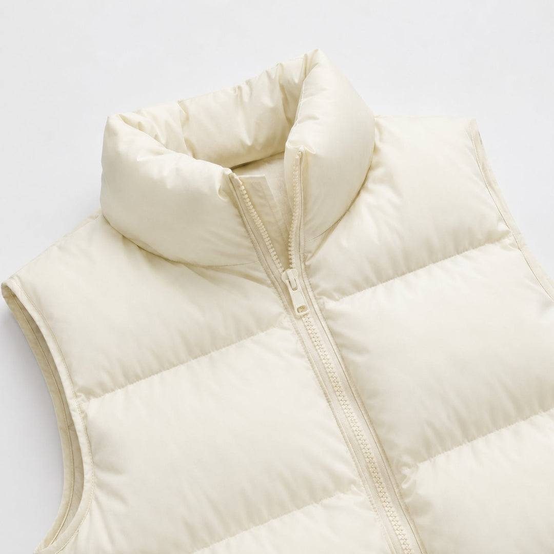 Women's cropped quilted puffer vest with high collar and front zipper