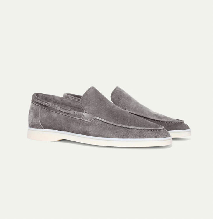 Men's slip-on loafers with moc toe stitching and low flat soles