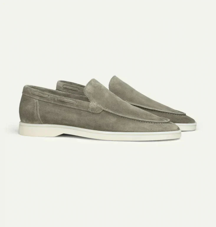 Men's slip-on loafers with moc toe stitching and low flat soles