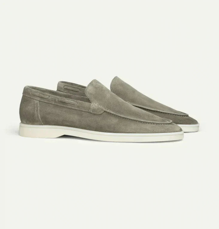 Men's slip-on loafers with moc toe stitching and low flat soles