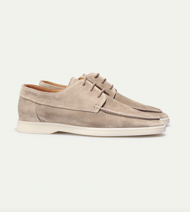 Men's lace-up moc toe loafers shown in navy and beige colourways