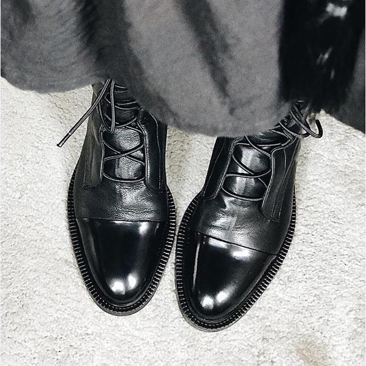 Women's lace-up mid-calf boots with a round toe and low heel in black and brown