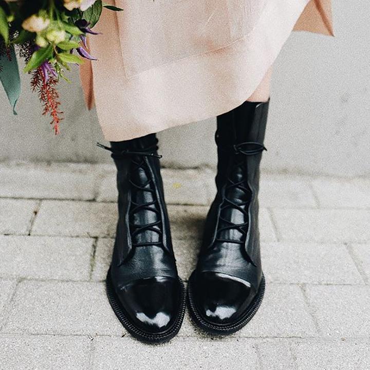 Women's lace-up mid-calf boots with a round toe and low heel in black and brown