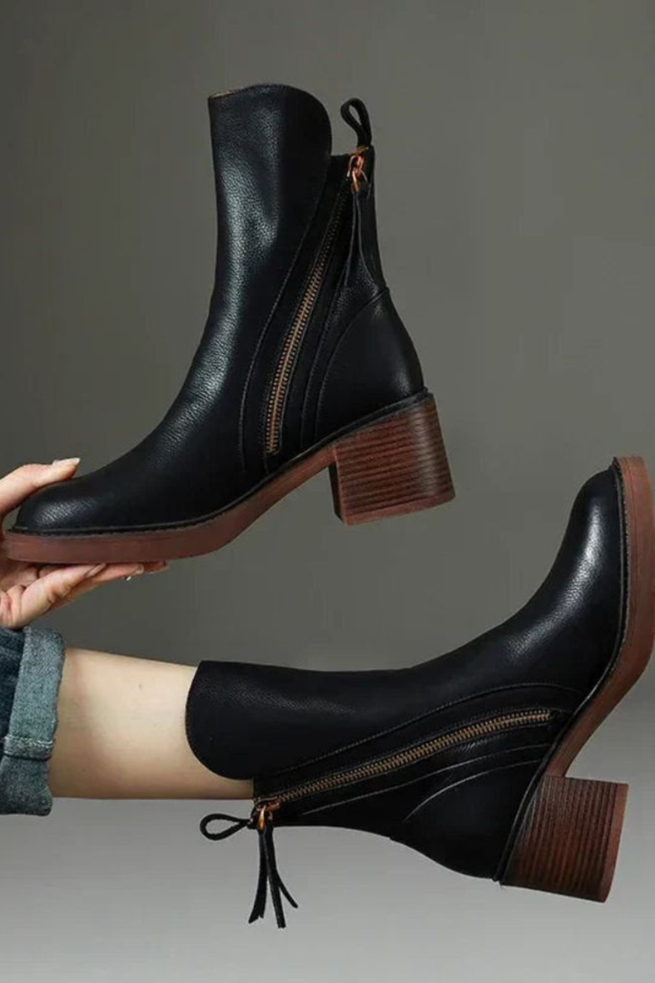 Side-zip ankle boots with rounded toes and block heels in black and brown colourways