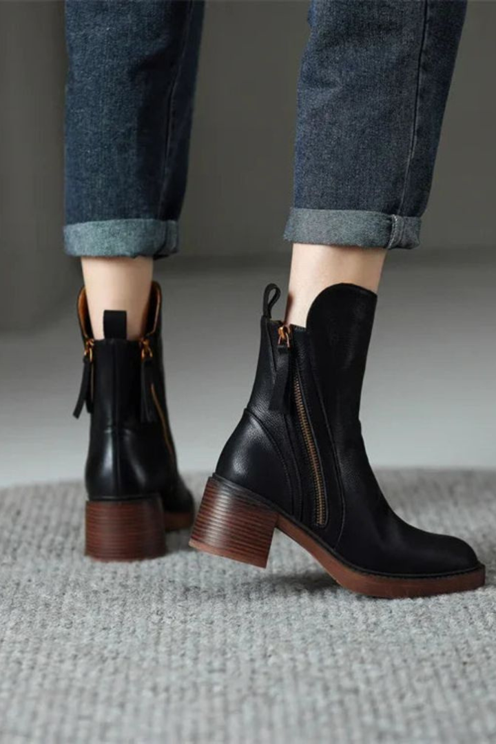 Side-zip ankle boots with rounded toes and block heels in black and brown colourways
