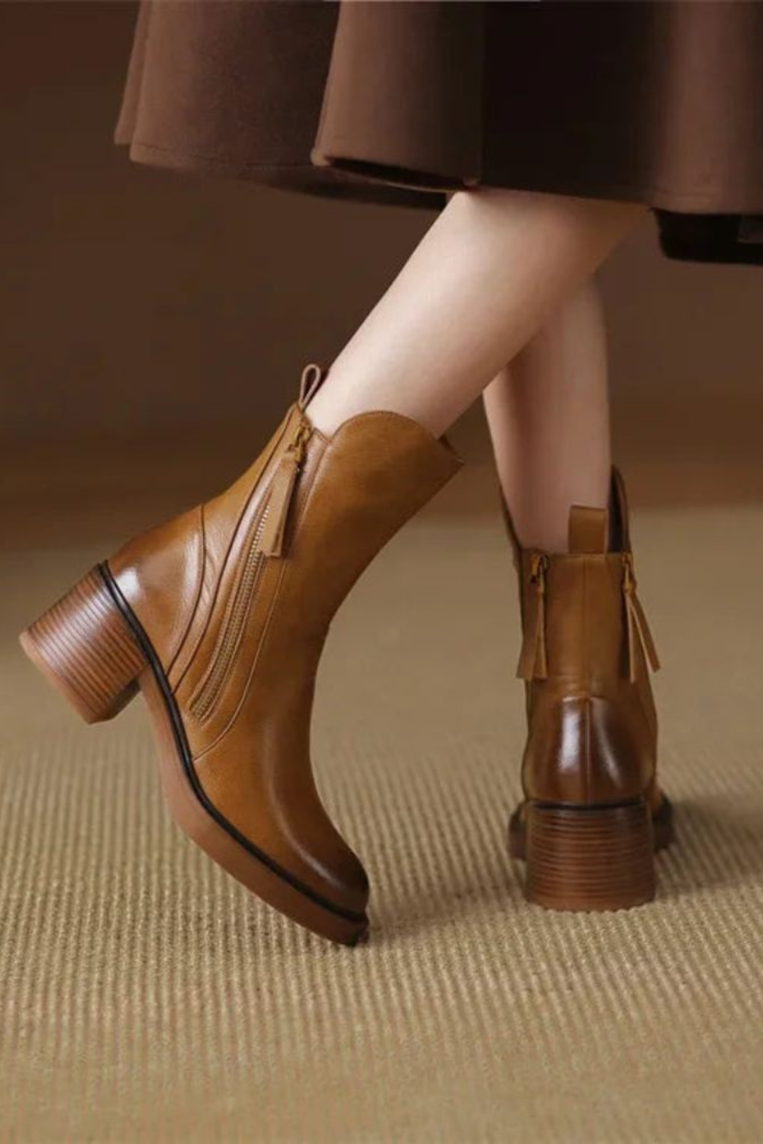 Side-zip ankle boots with rounded toes and block heels in black and brown colourways