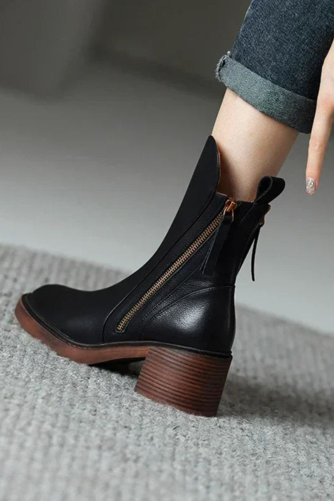 Side-zip ankle boots with rounded toes and block heels in black and brown colourways