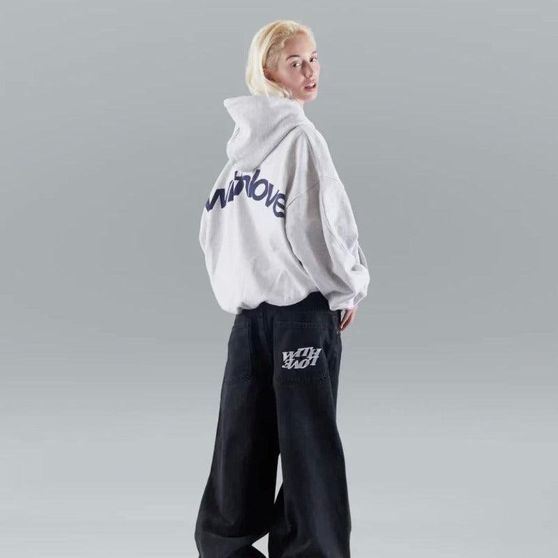 Women's hooded pullover with long sleeves and large back text graphic