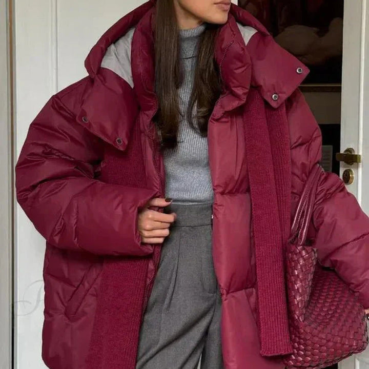 Women's hooded quilted puffer winter coat with zip front and long sleeves