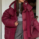 Women's hooded quilted puffer winter coat with zip front and long sleeves