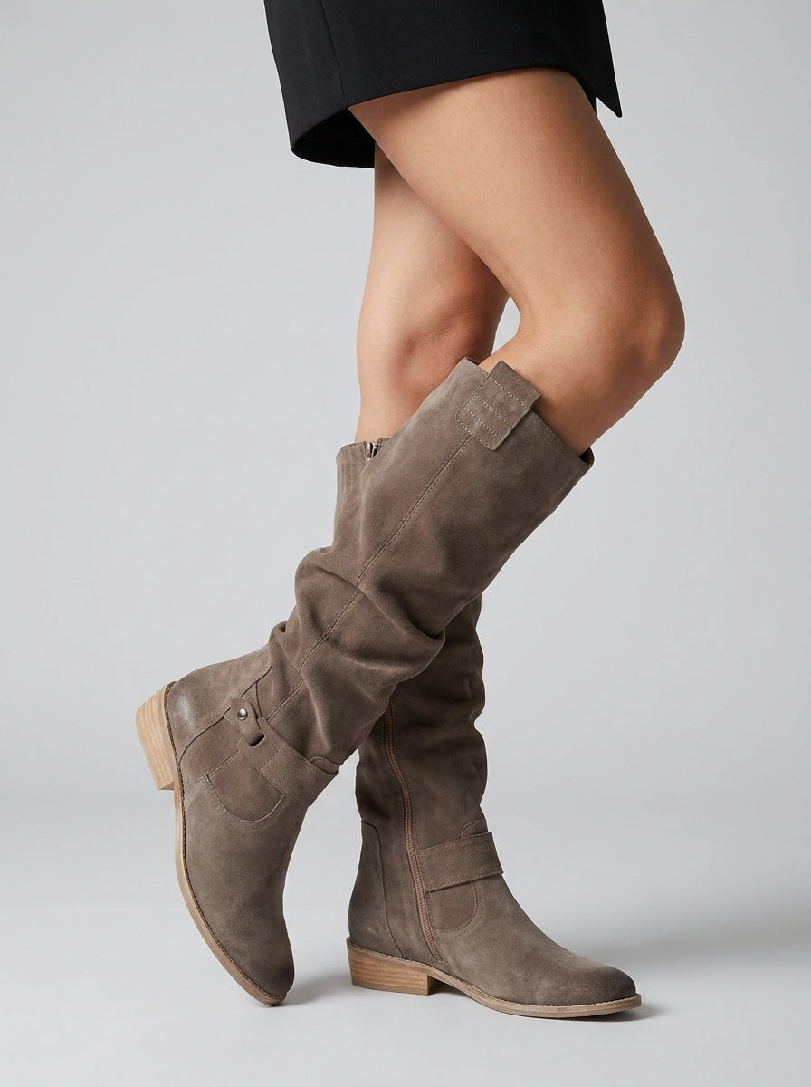 Women's knee high slouchy boots with buckle detail and low heel