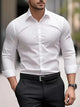Men's slim fit long-sleeve button-up shirt with pointed collar