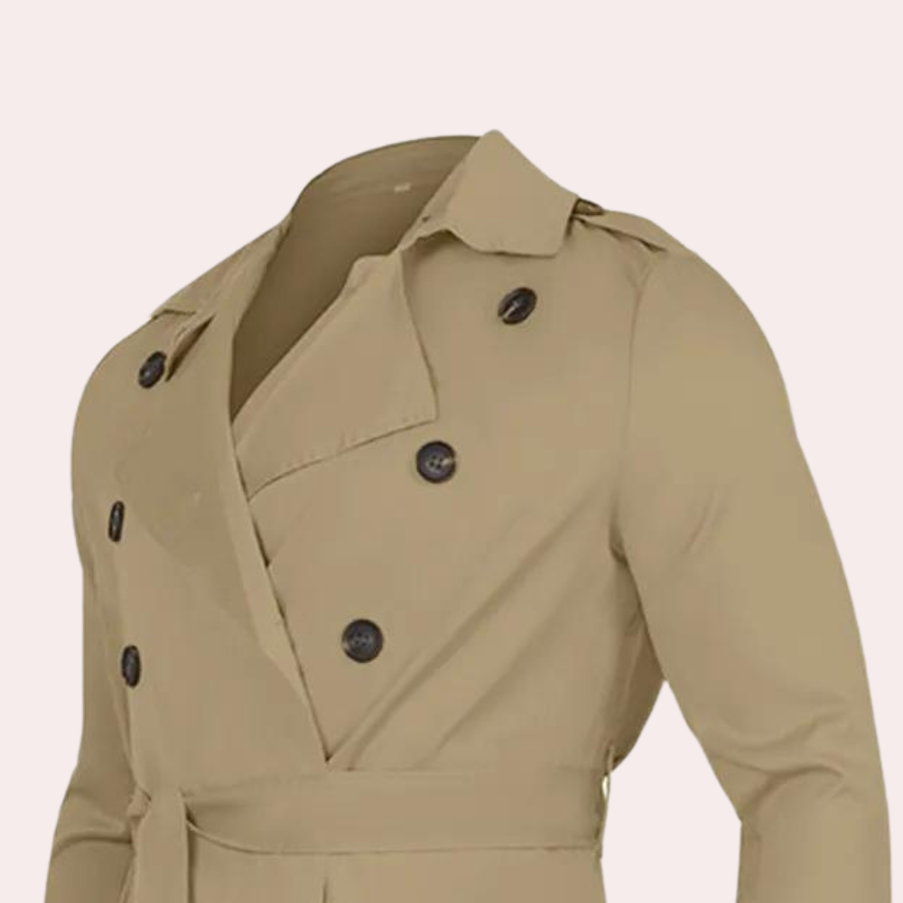 Men's long double-breasted trench coat with pointed collar and storm flap details