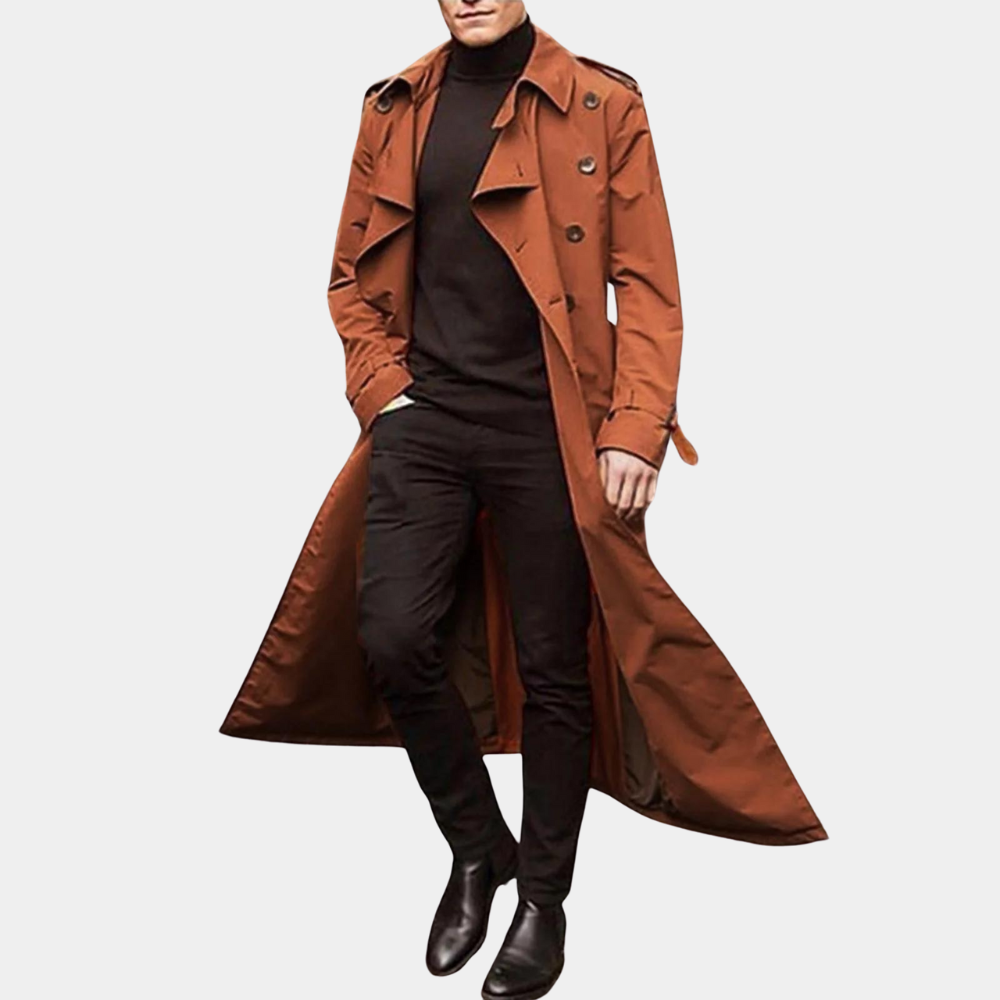 Men's long double-breasted trench coat with pointed collar and storm flap details