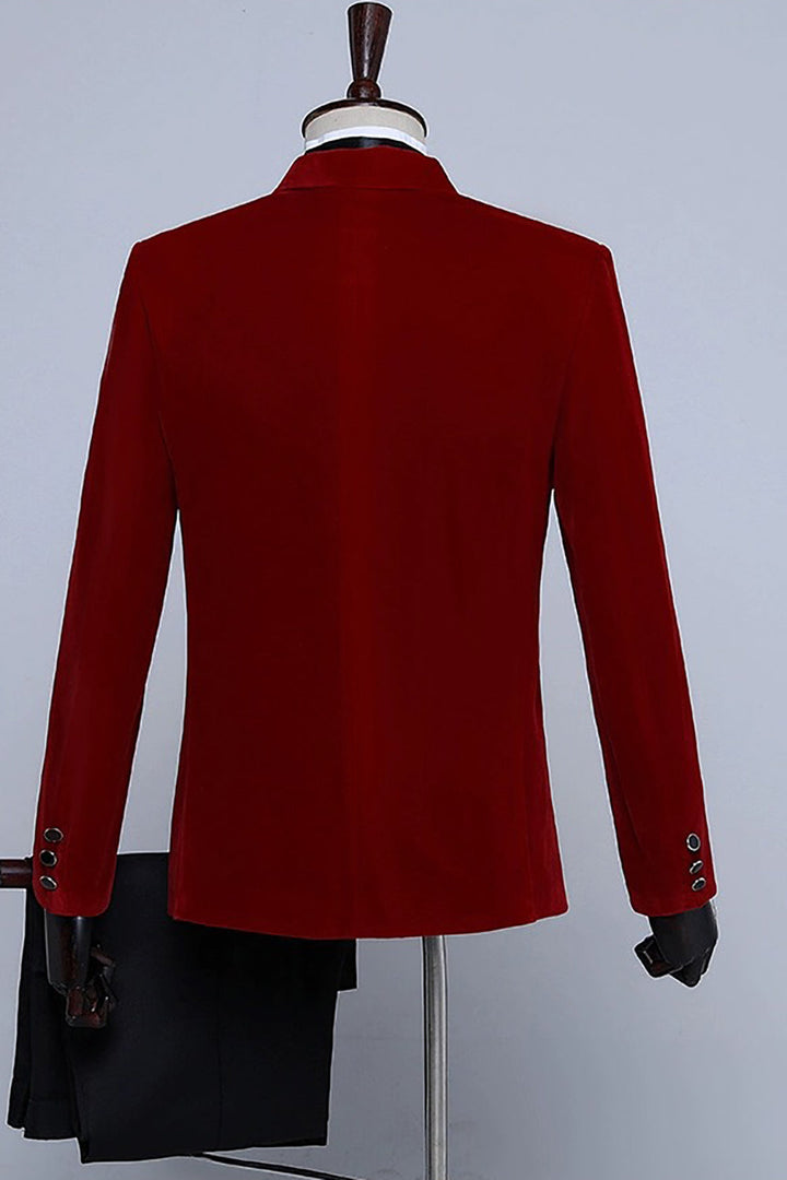 Men's velvet-textured tuxedo suit with peak lapels, bow tie and matching trousers