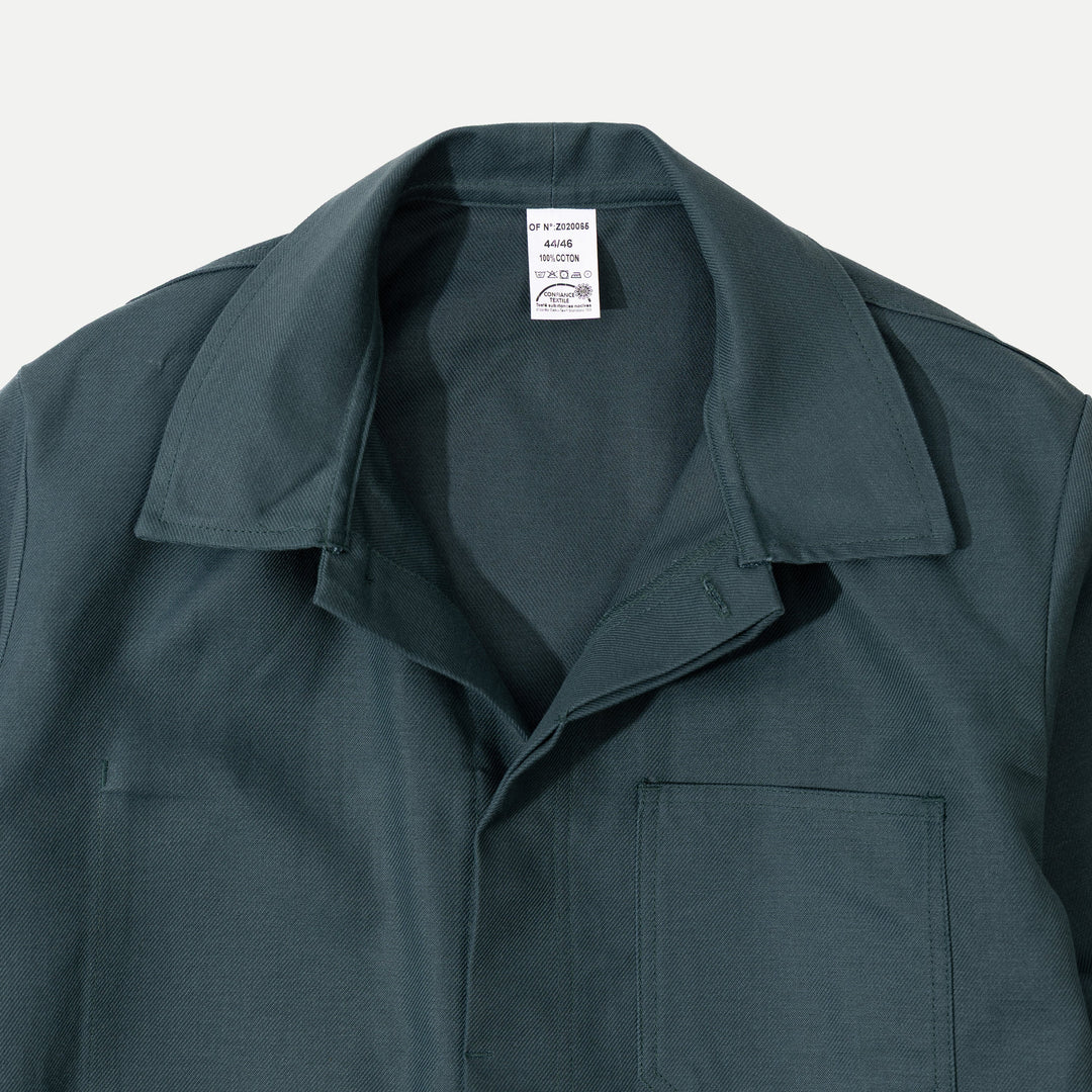 Men's dark green utility jacket with spread collar, button front and patch pockets